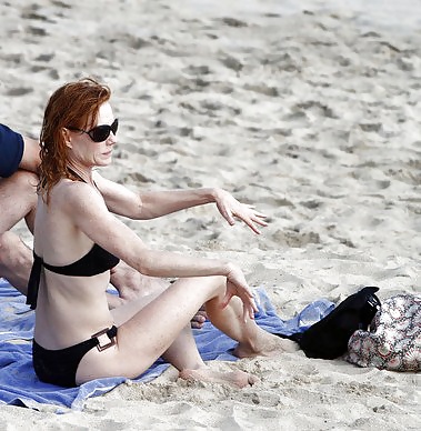 Beautiful Marg Helgenberger wearing black bikini. #25478888