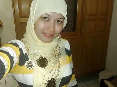 Indonesia- hijab girl captured during lovemaking #25802499