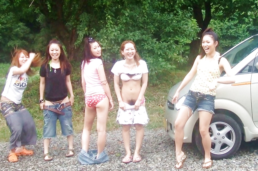 20 year old Asian chick flashing pussy with friends 2013