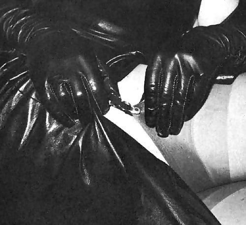 Leather gloves, boots and costume. #36928799