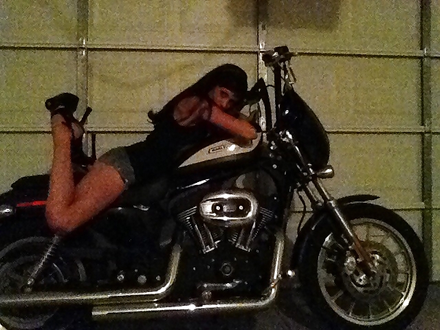 Zoe sexing it up on levi's harley
 #24807219