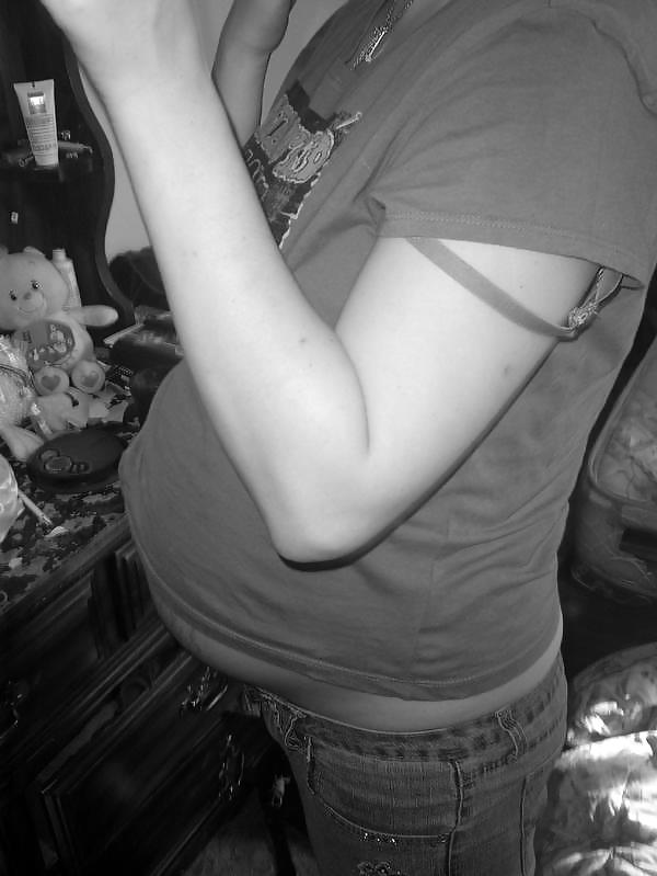 Big pregnant belly in tight clothes #33274482