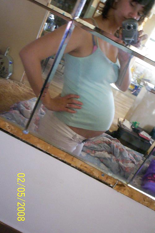 Big pregnant belly in tight clothes #33274499