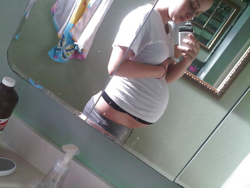 Big pregnant belly in tight clothes #33274503