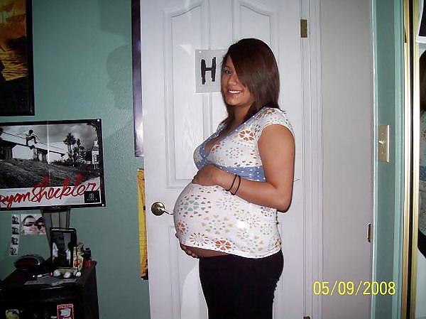 Big pregnant belly in tight clothes #33274521