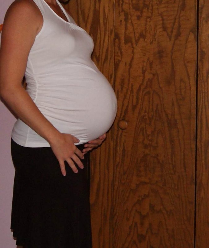 Big pregnant belly in tight clothes #33274529