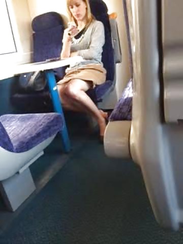 Candid blonde on train shows legs and upskirt #33320725