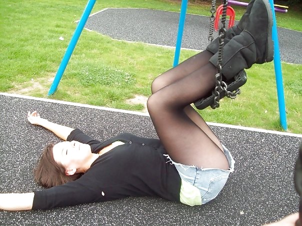 Babes in pantyhose-girl on a swing. #23563130
