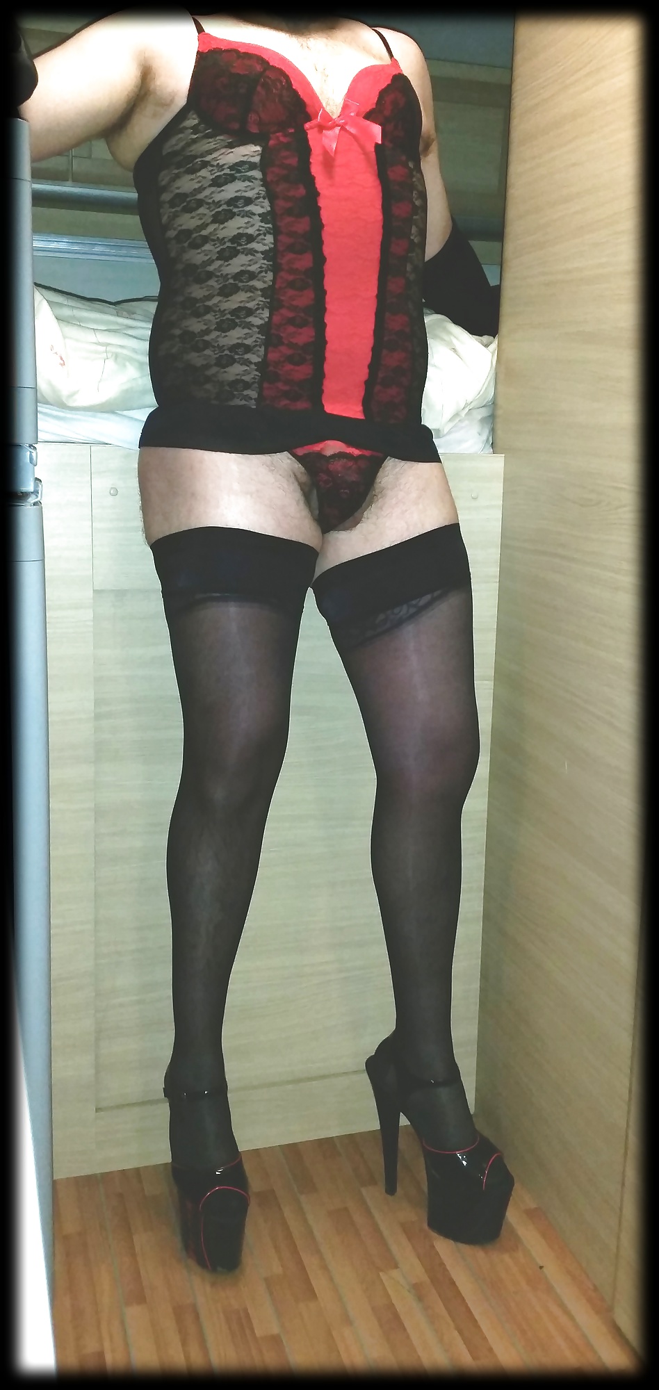 Sexy crossdresser in lingerie and heels #40799665