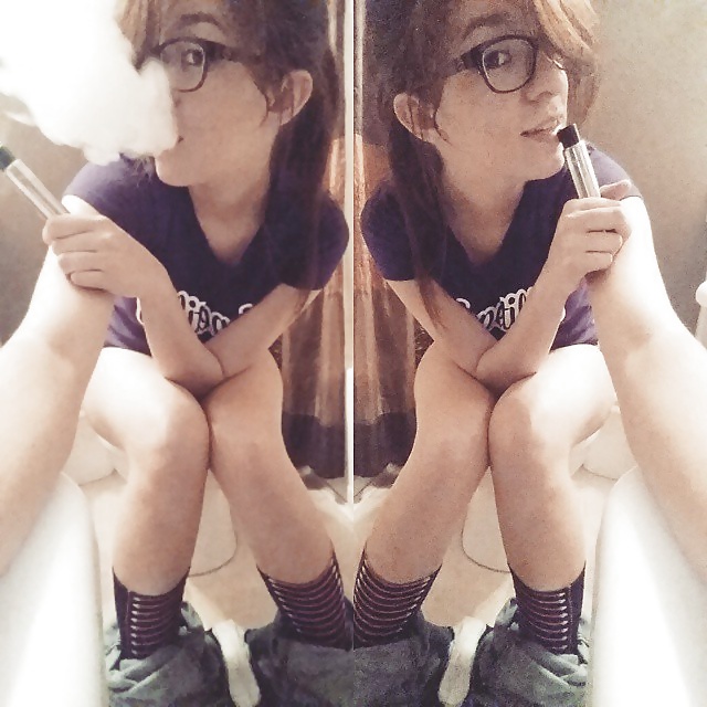 Nerdy smoking on the toilet #40687779