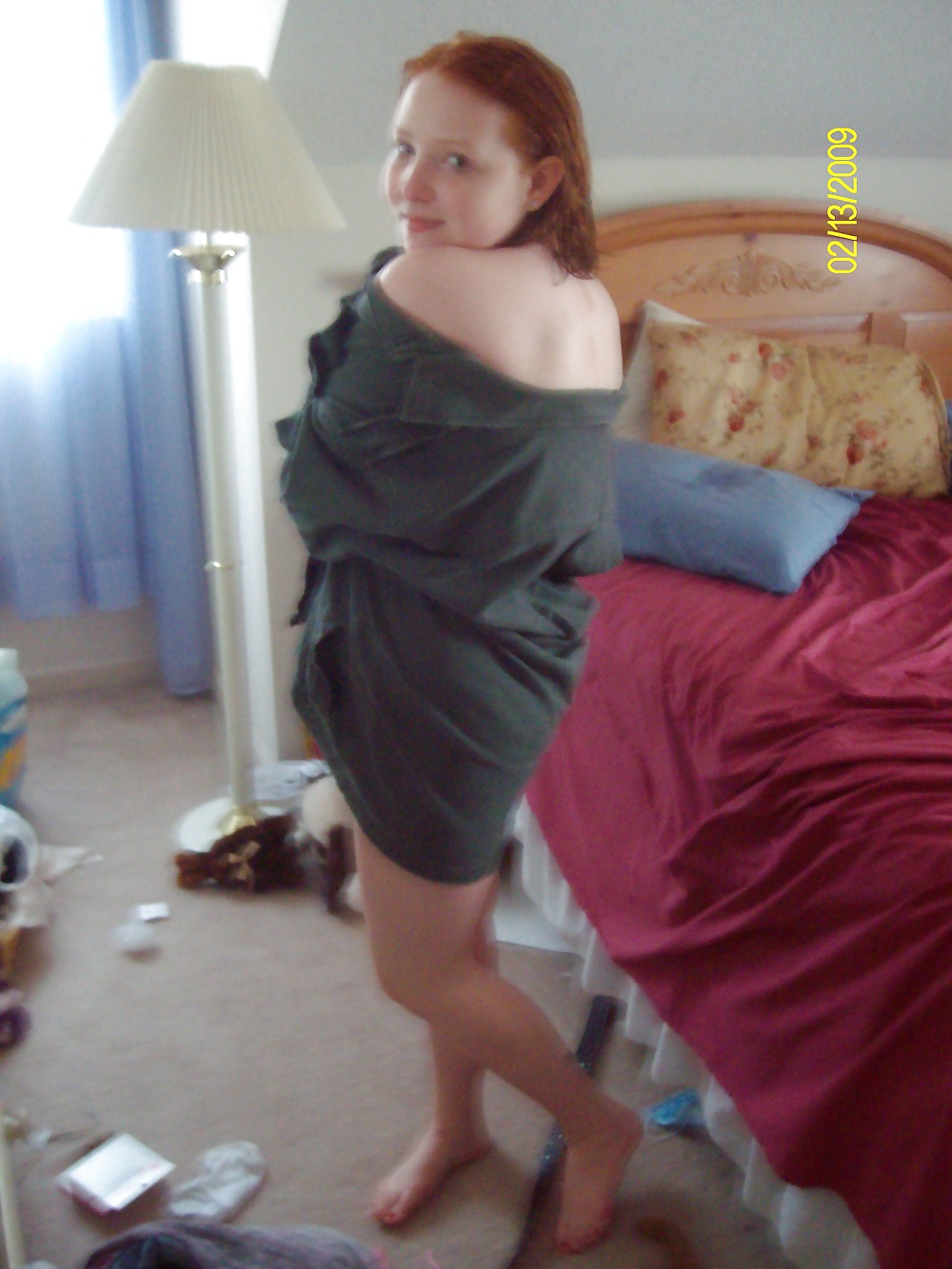 Cute Red Head Poses in her Messy Apartment  #33415748