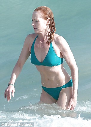 Beautiful Marg Helgenberger wearing green bikini. #28144140