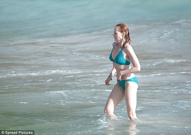 Beautiful Marg Helgenberger wearing green bikini. #28144146