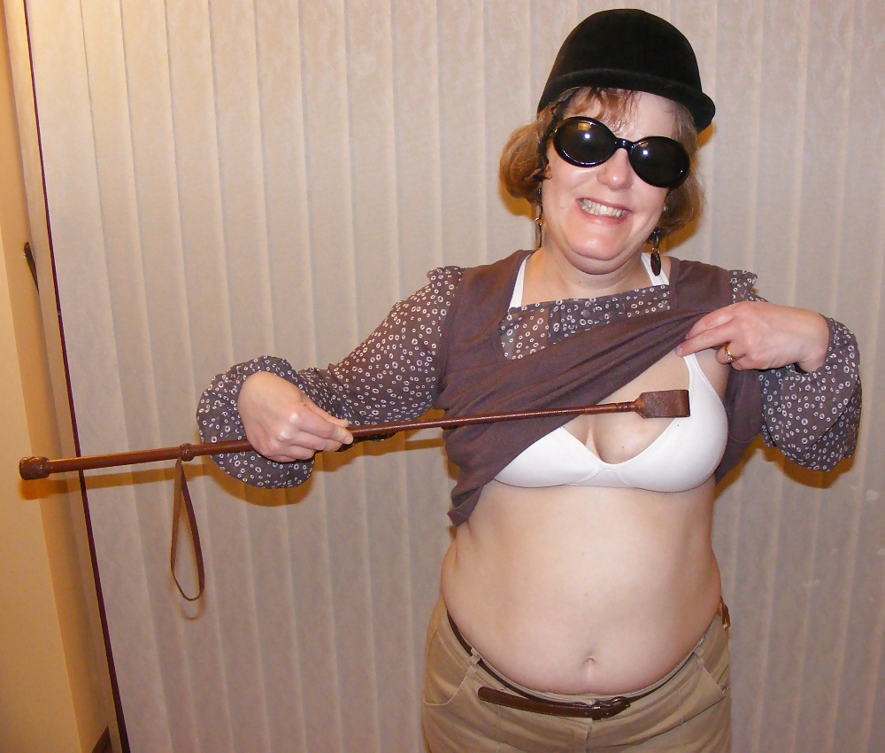 White knickers, boots, and riding crop #25226781