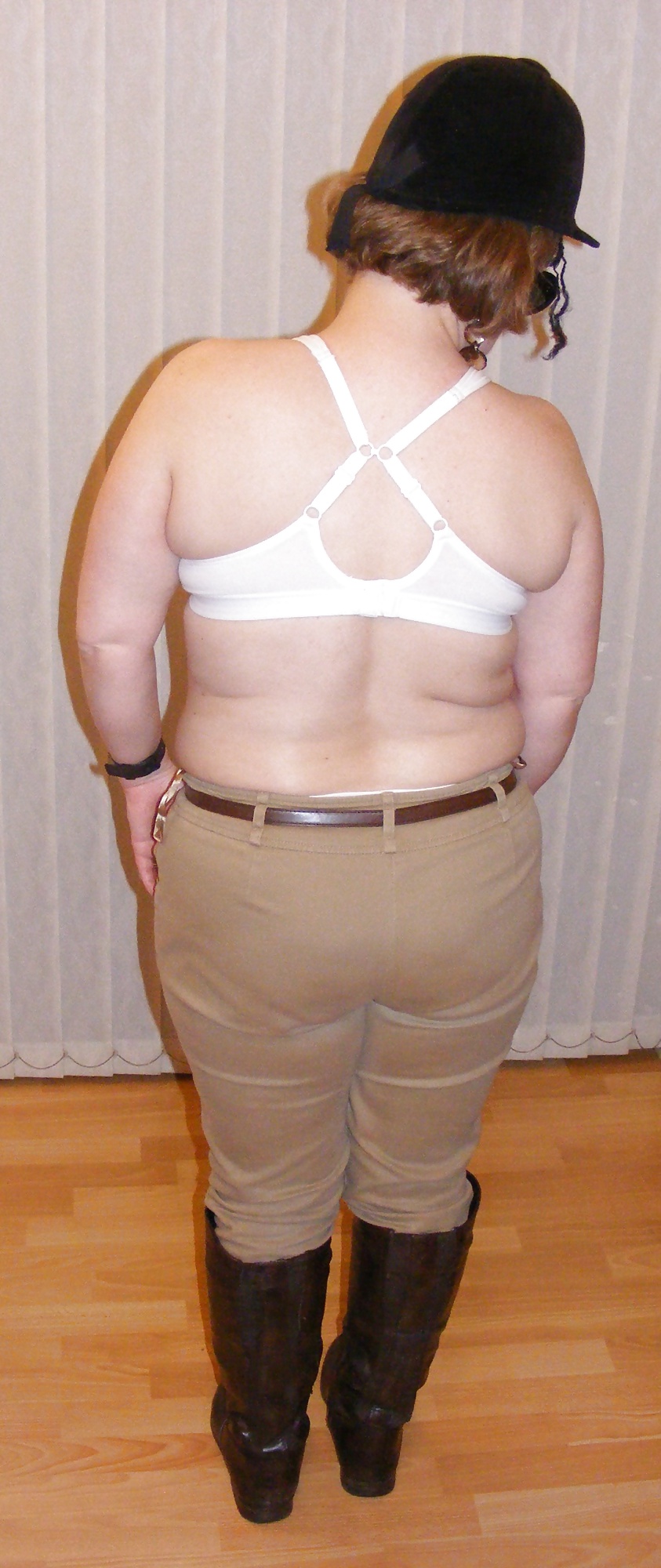 White knickers, boots, and riding crop #25226796