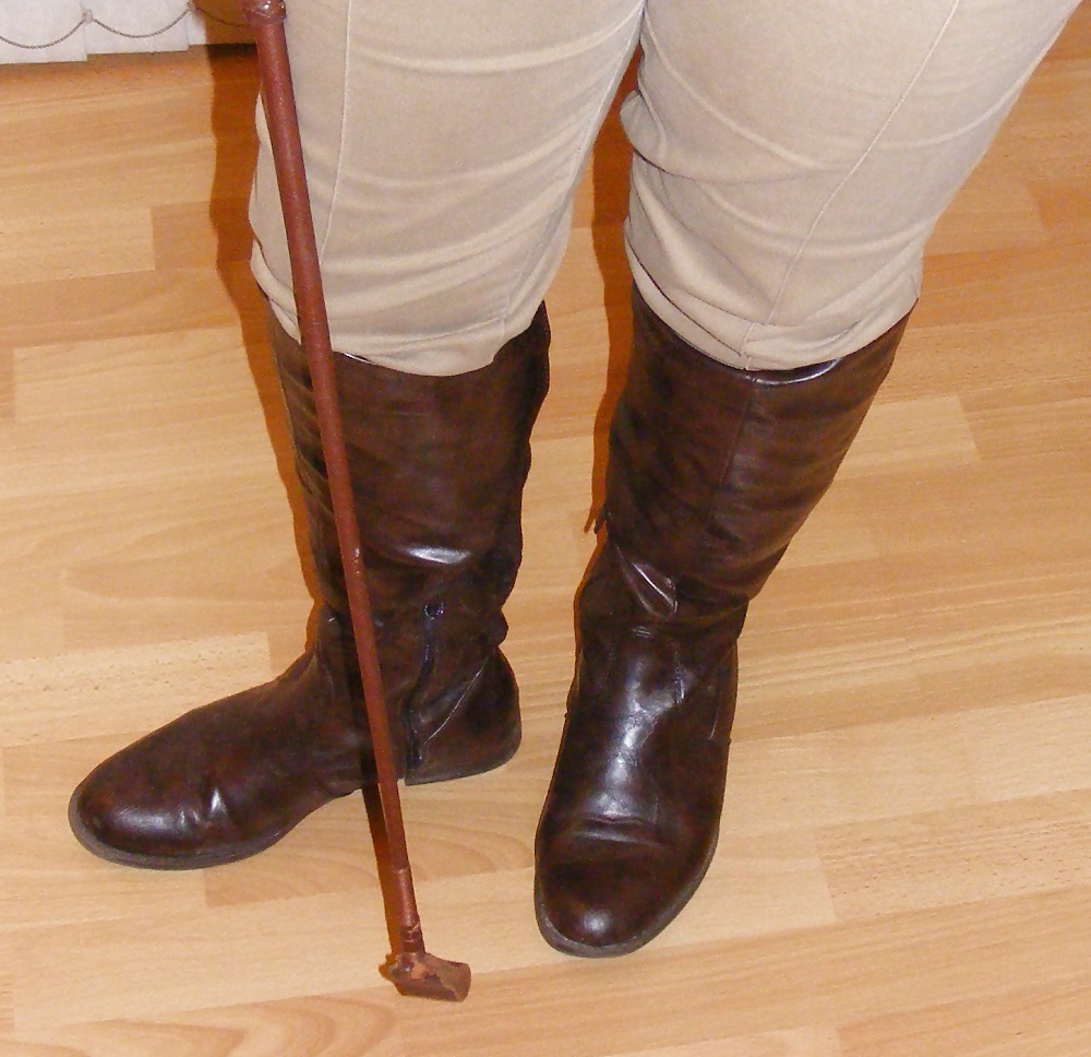 White knickers, boots, and riding crop #25226811