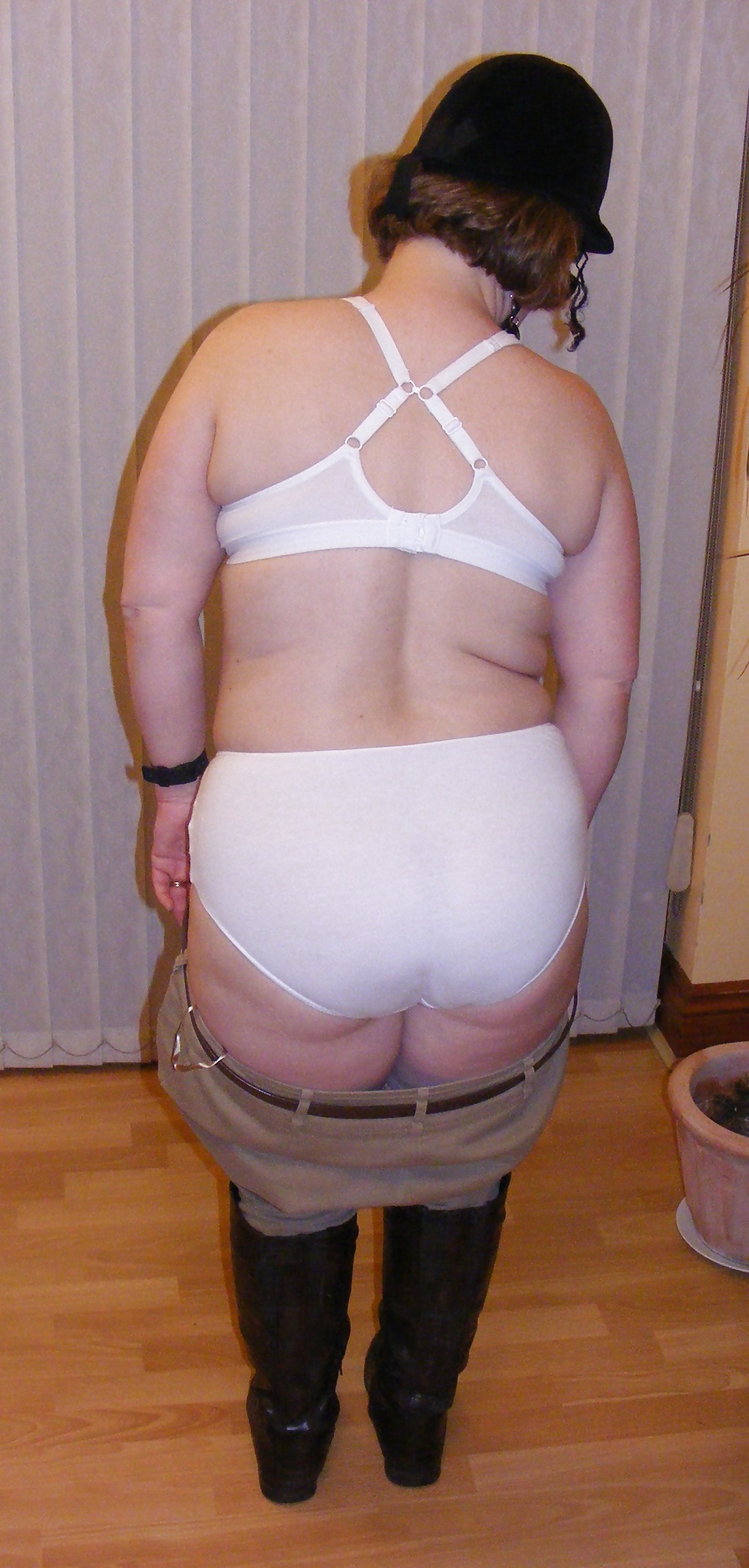 White knickers, boots, and riding crop #25226848