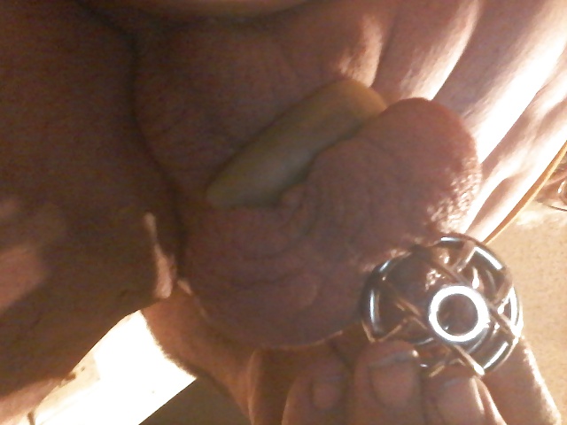 Seperated balls while in chastity device #28982204