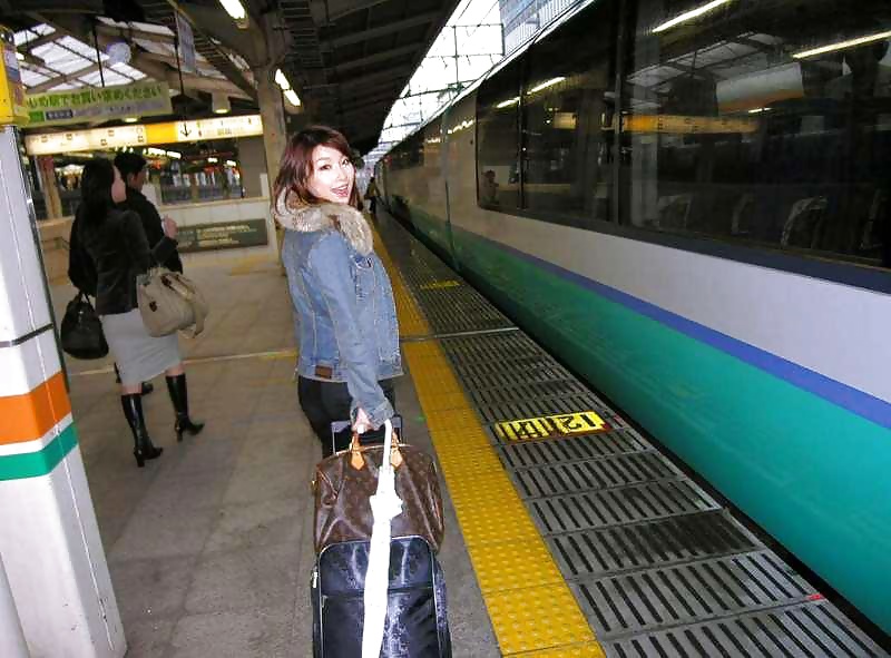 Japanese girl has fun on the train