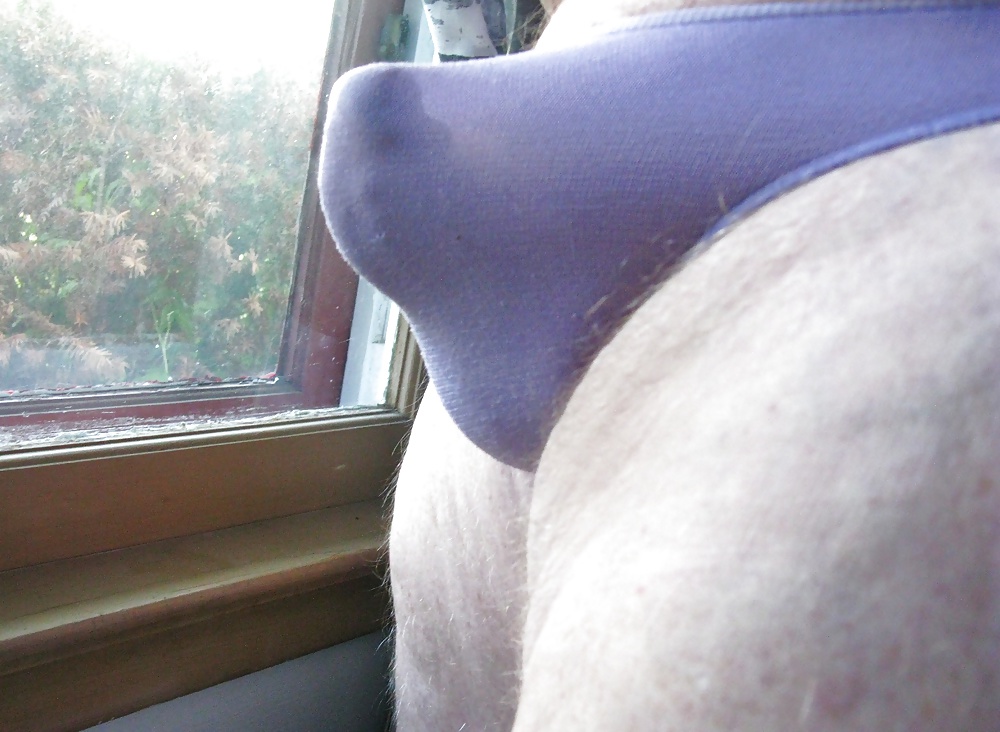 Purple Panty in front of the window #29840384