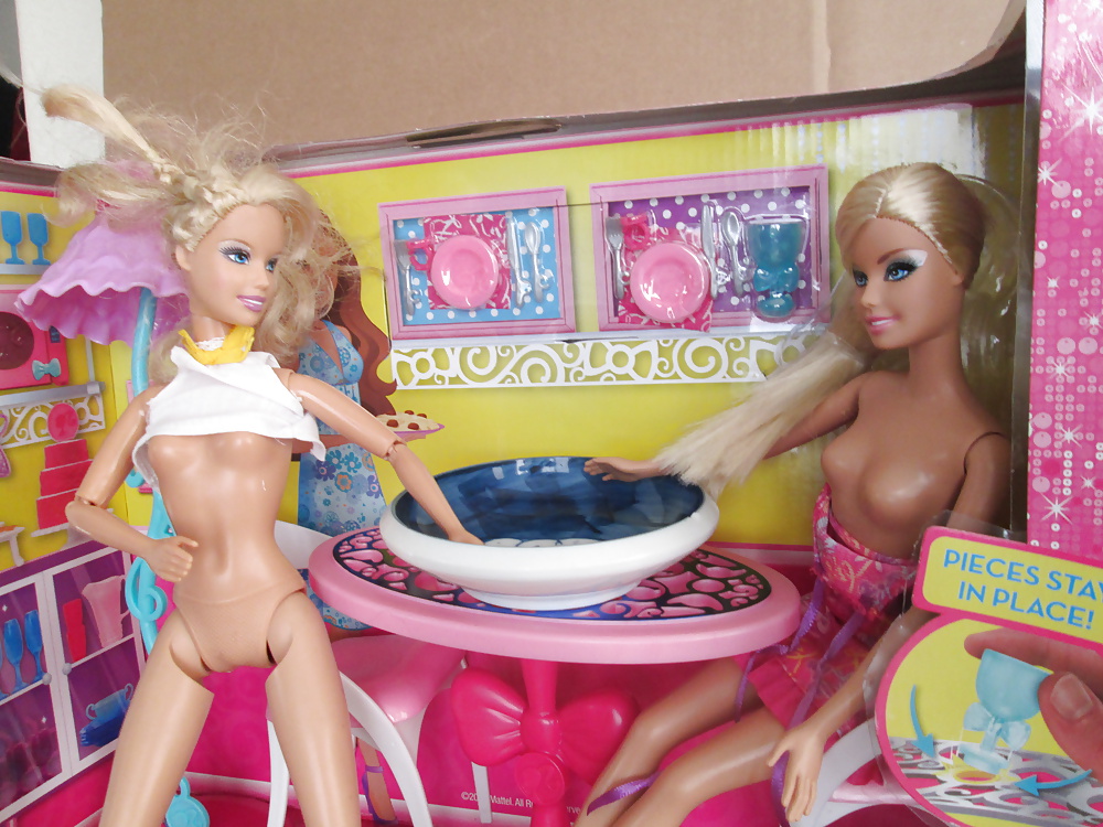 Twin Barbie sisters share a snack #40383745
