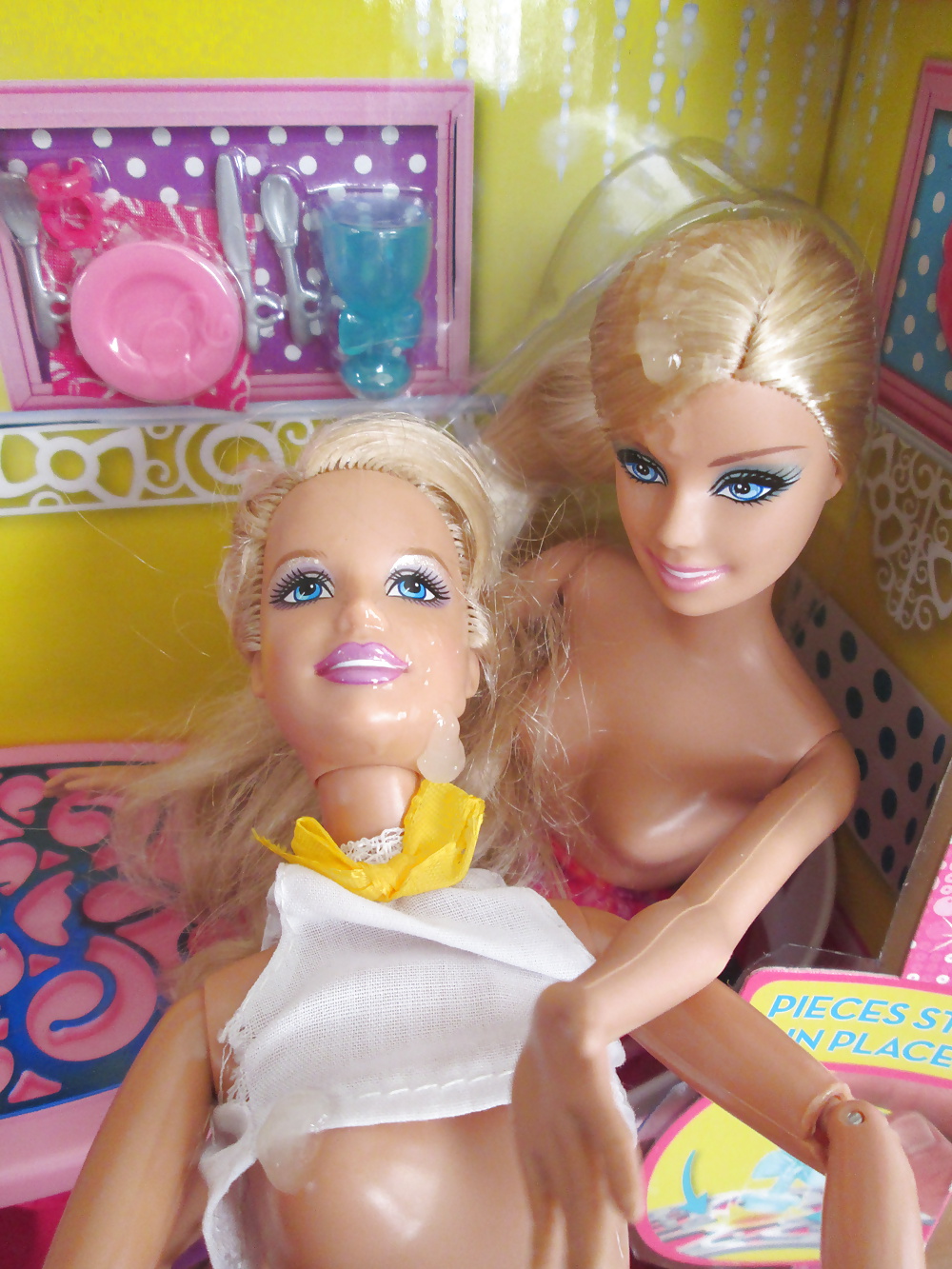 Twin Barbie sisters share a snack #40384059