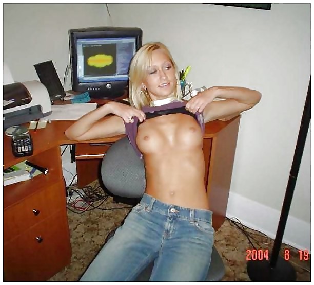 Topless at the Computer #23767571