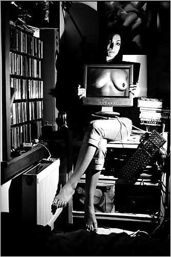 Topless at the Computer #23767615