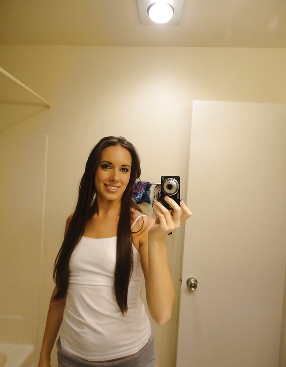 Young bitch in white shirt posing in the mirror #39557252