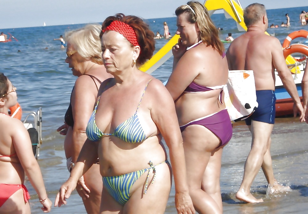 Beautiful mature women on the beach #26727356