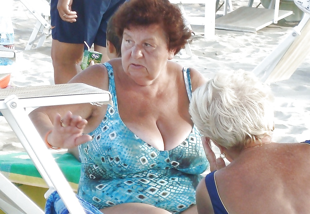 Beautiful mature women on the beach #26727430