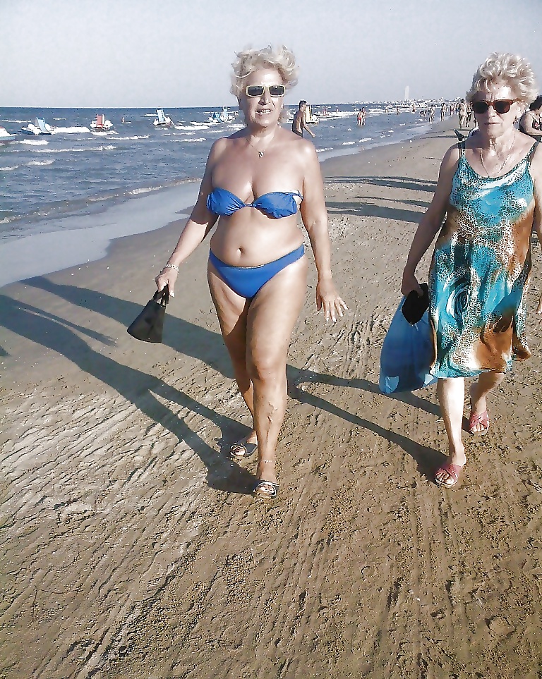Beautiful mature women on the beach #26727472
