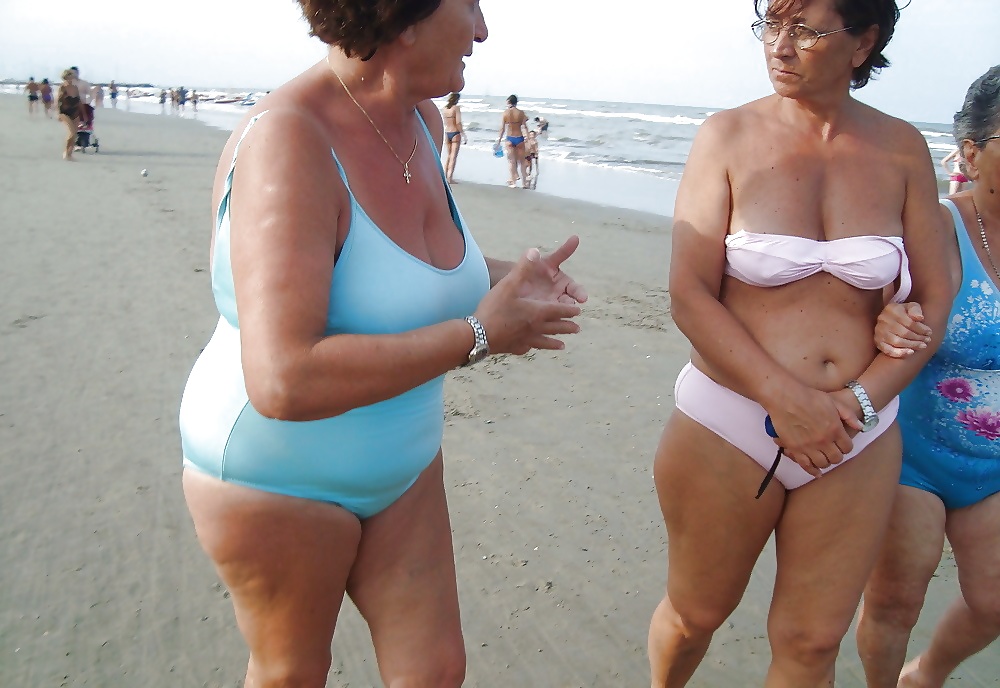 Beautiful mature women on the beach #26727484