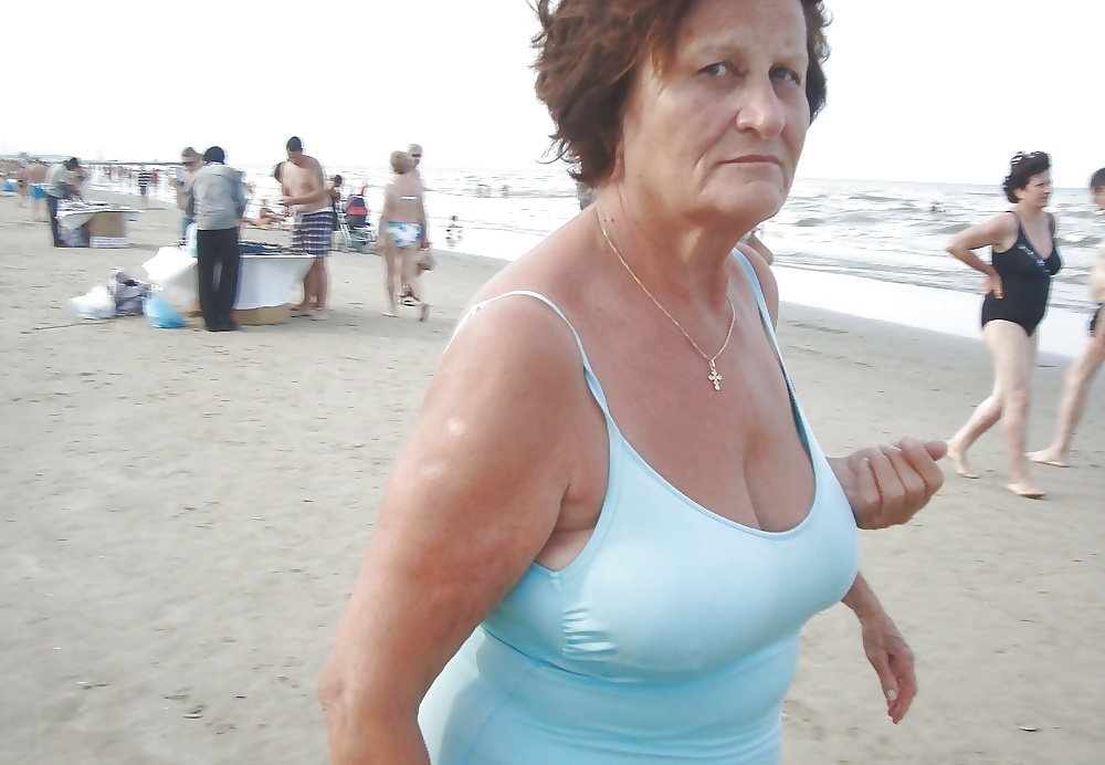 Beautiful mature women on the beach #26727510