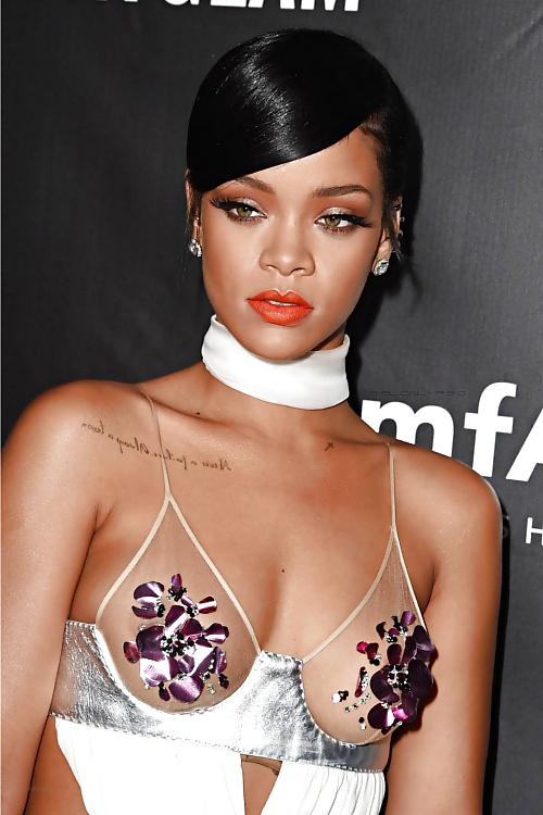 Rihanna at 2014 amFAR inspiration Gala  #31402659