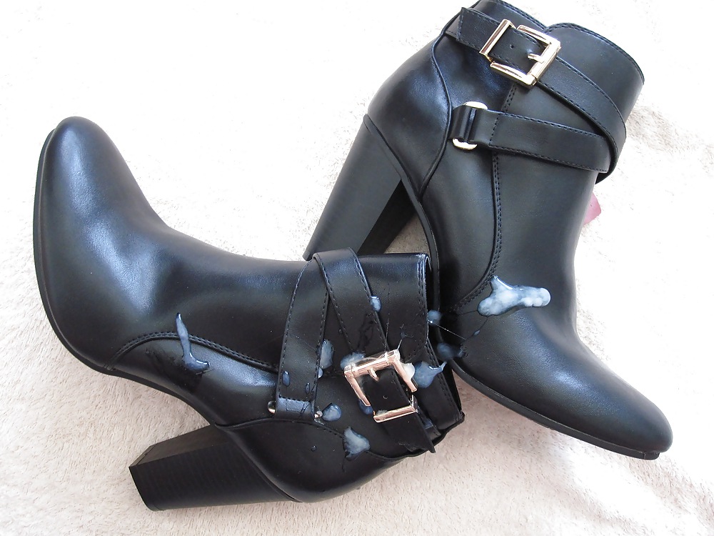 Black leather heeled boots cummed