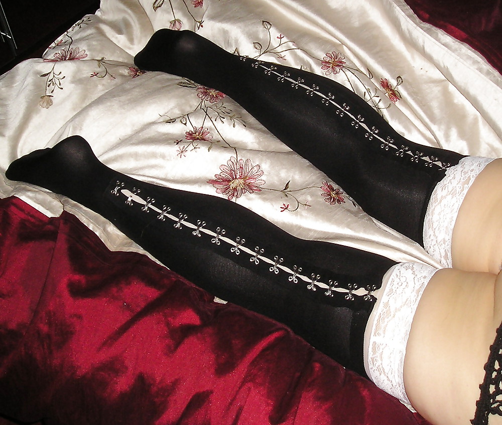 White stocking tops and black knee high socks #22975216
