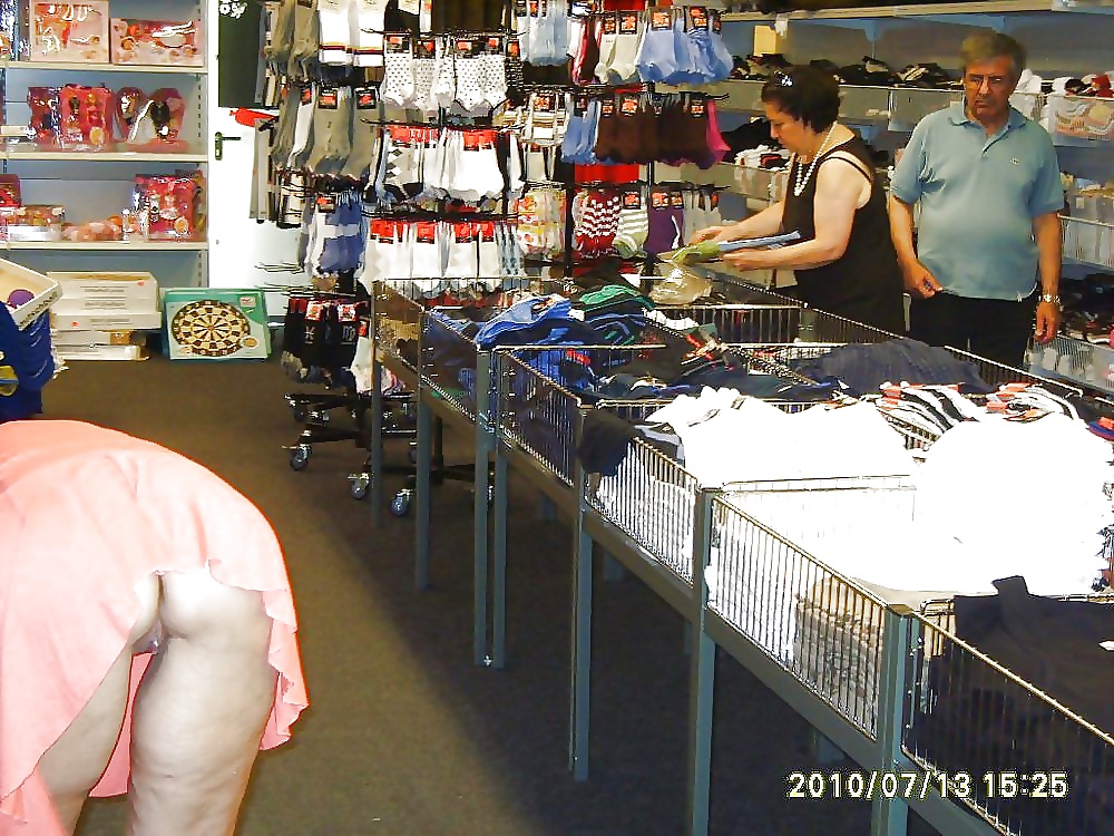 Bare arses showing, shopping. #24596740