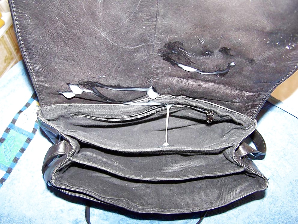 Cum for black leather handbag #31667386
