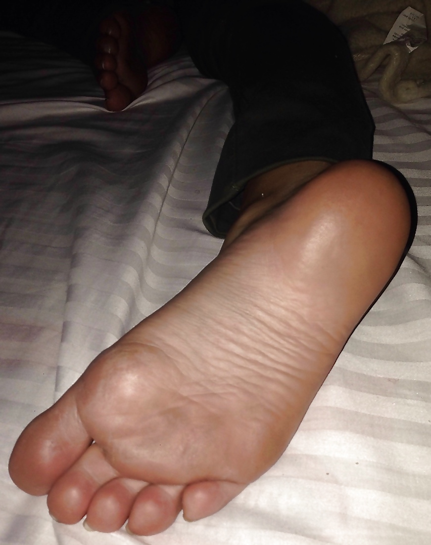 Friend's feet on bed #24435252