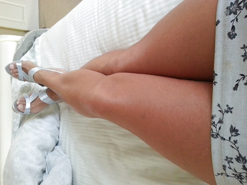Silver heels and dress in bed #28587095