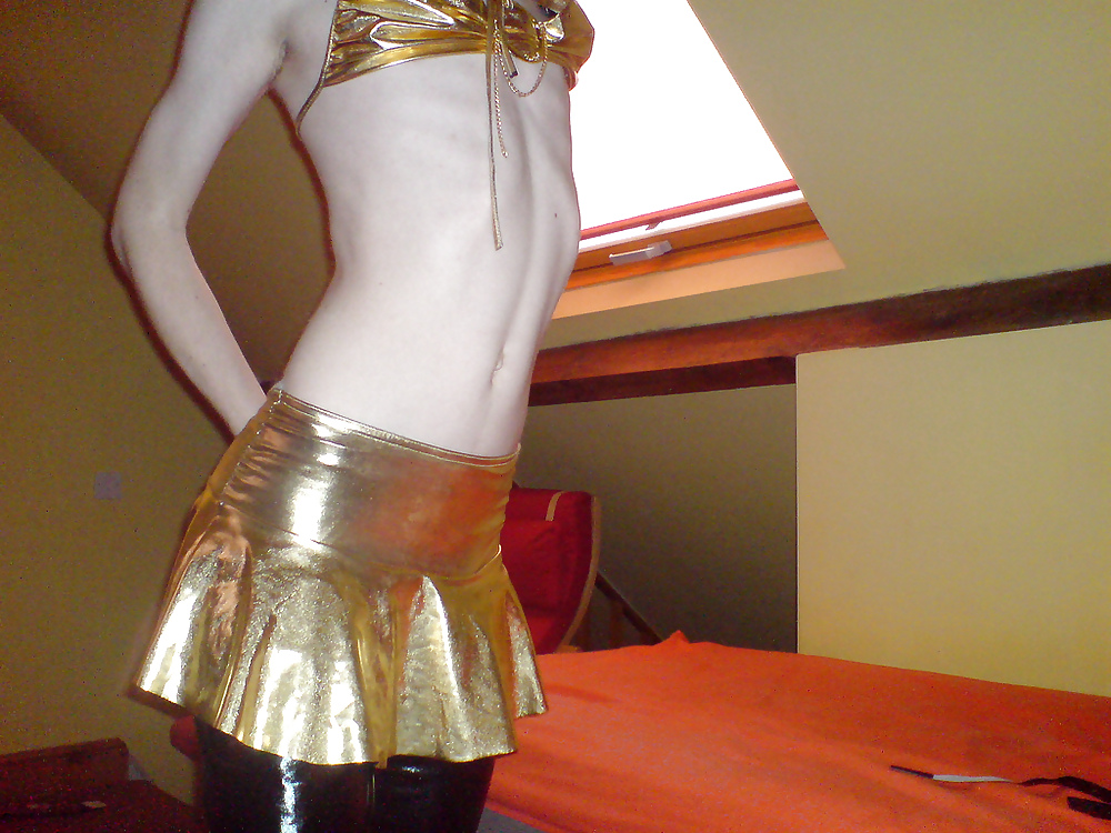 Sissy wears a gold mini skirt & bra #35904157