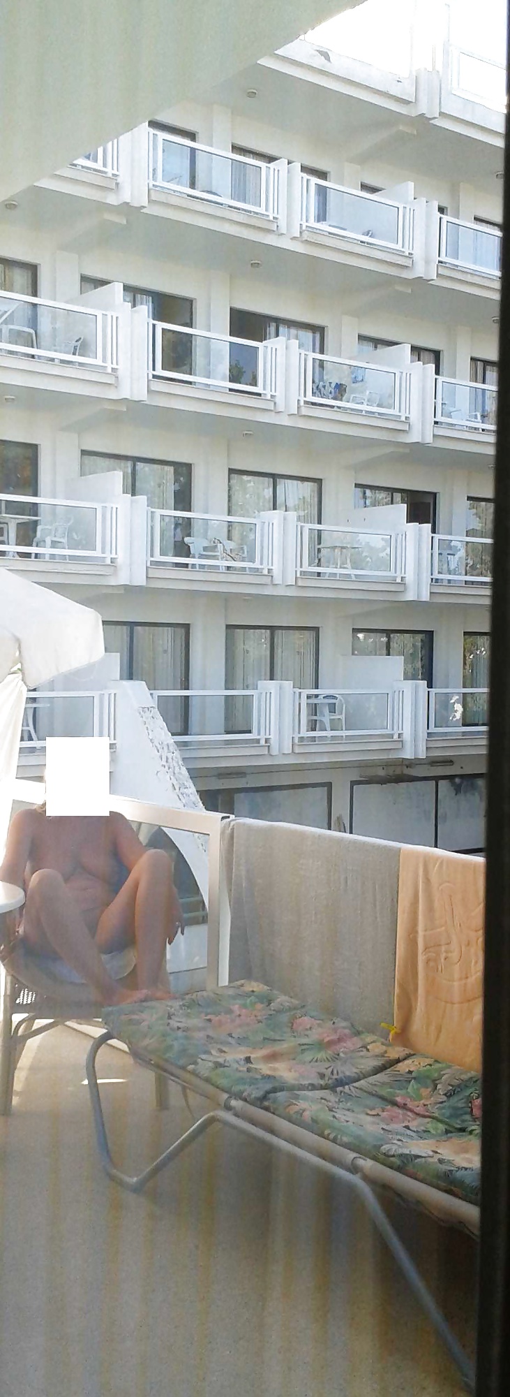 Flashing nude on a hotel balcony #28572358