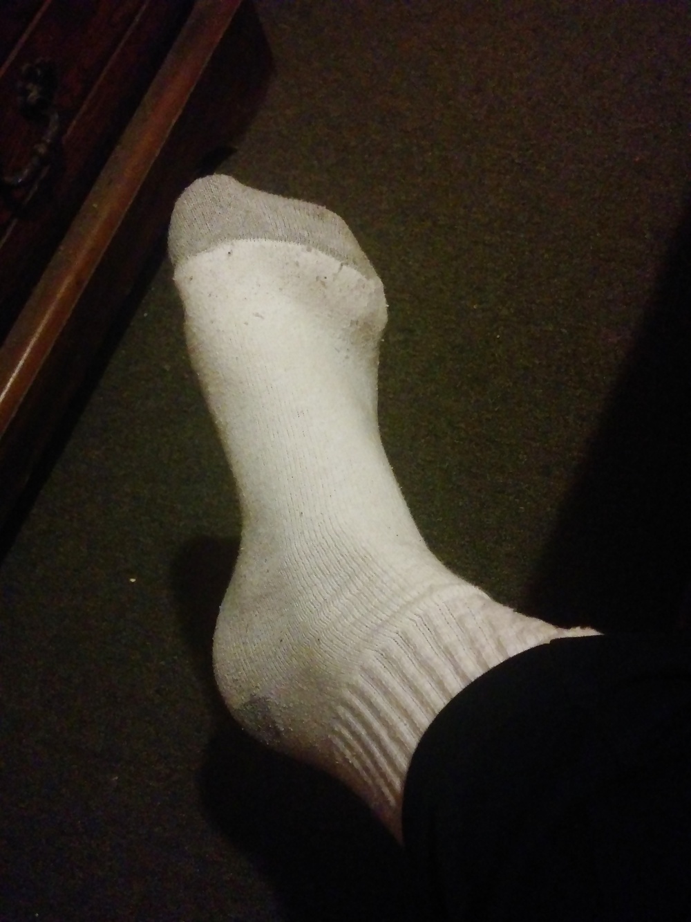 Putting on some clean socks #40978161