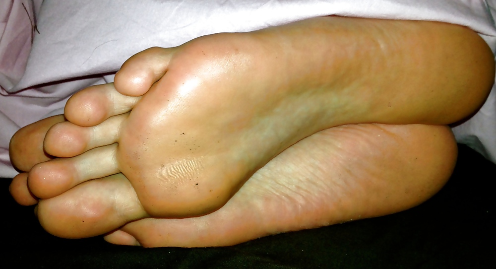 My friend's feet soles caught on bed #25107335