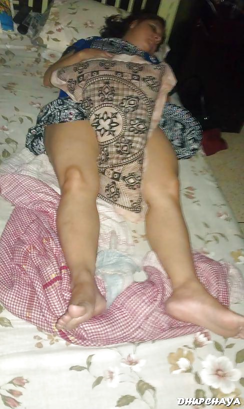 Desi bhabhi laying on bed and show
 #35433237