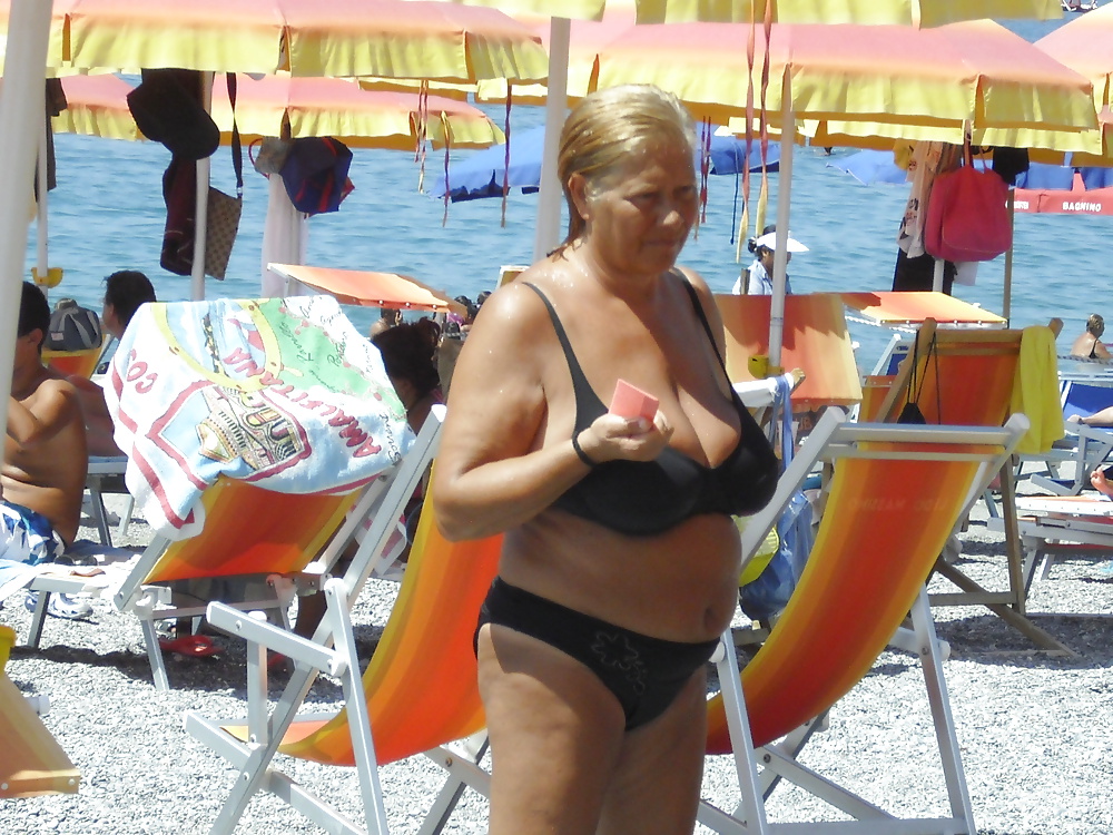 Old ladies with big tits in a swimsuit on the beach #38981545