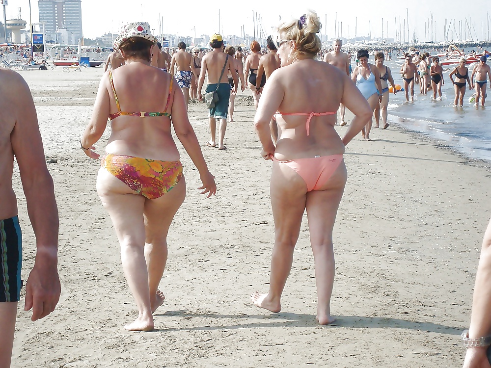 Old ladies with big tits in a swimsuit on the beach #38981553