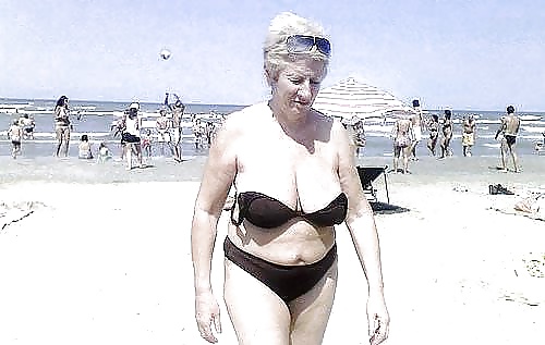 Old ladies with big tits in a swimsuit on the beach #38981656