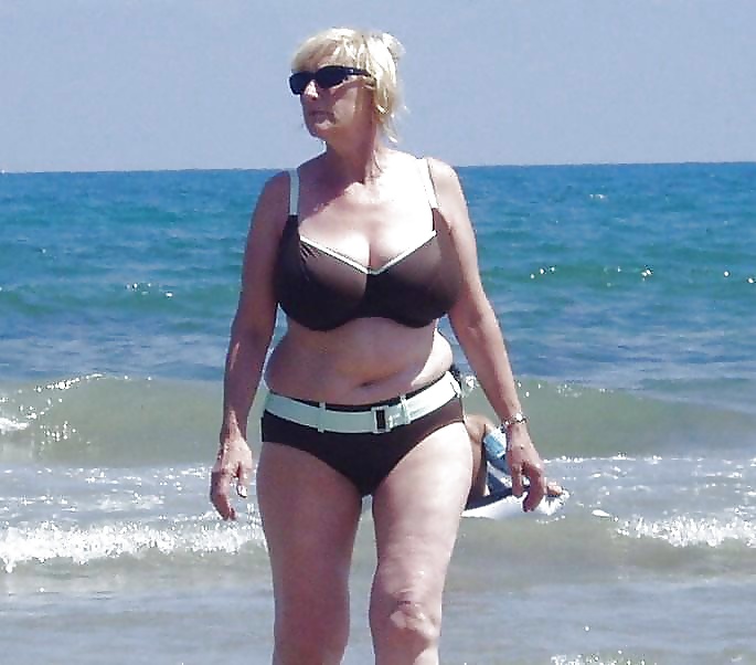 Old ladies with big tits in a swimsuit on the beach #38981673